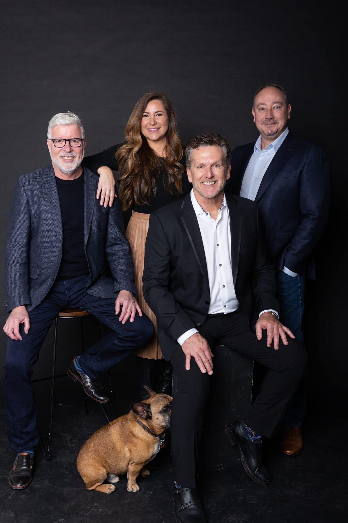 Dan Cooper Group agents in the studio with Tyson the French bulldog